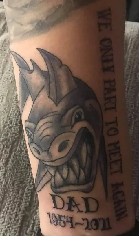 Memorial piece with the words We only part to meet again and Dad with dates