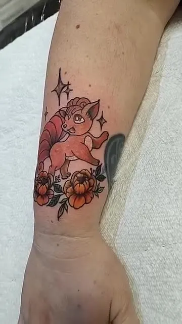 Cartoon fox character with orange flowers on the forearm, color
